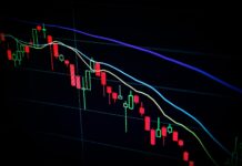 Americké akcie zpevnily, Fed nechal úrokové sazby podle očekávání beze změny obchodování, investování, rozdíly