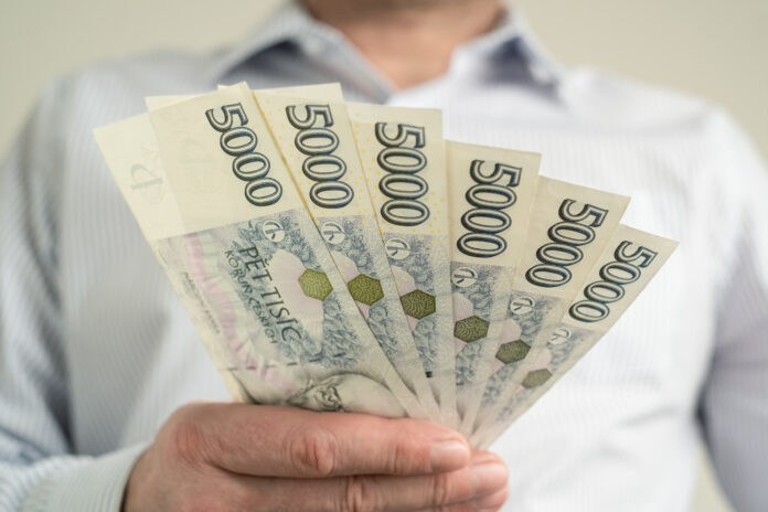 Czech Money in cash to do a task cork board in the background Finance in Czechia concept Czech Koruna 5000 CZK banknotes Business cash credit finance concept currency paper Pět tisíc